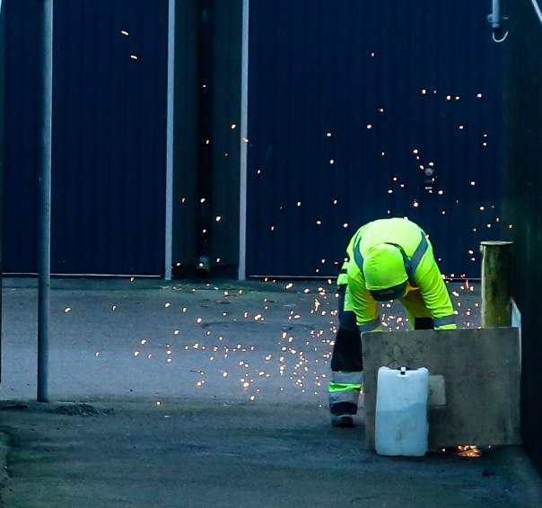Shutter speed is at 1/100 of a second and the sparks looks like dots